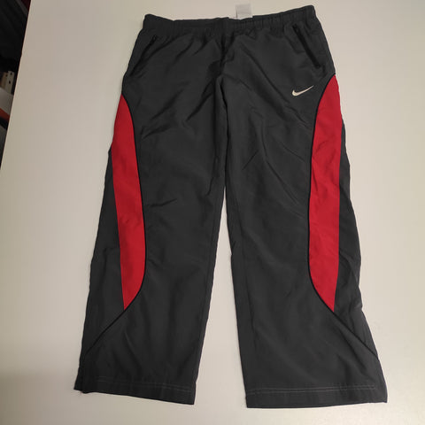 Nike Trackpants Vintage XS - S (Gr M fällt kleiner aus) baggy jeans nylon Stoff aus Regenjacke #9243