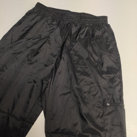 Reebok Vintage Trackpants Baggy L- XL full black nylon stoff aus Regenjacke #8532