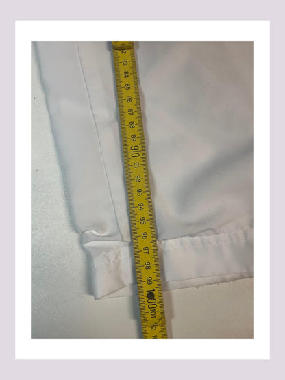 Entdecke unsere Vintage Track Pants von Nike und anderen Marken, erhältlich bei Valuxery.de - Dein Shop für trendige Vintage - Kleidung. Unsere Track Pants sind aus hochwertigen Materialien und