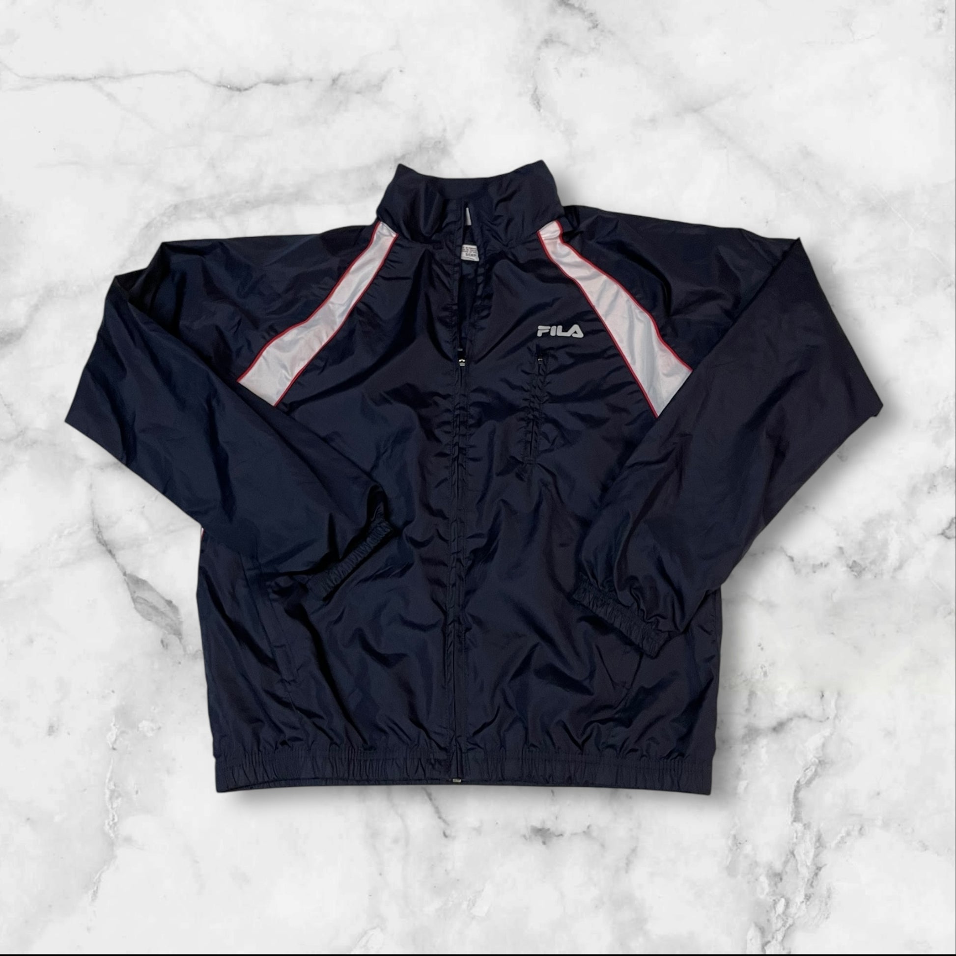 Entdecke unsere Vintage Track Pants von Nike und anderen Marken, erhältlich bei Valuxery.de - Dein Shop für trendige Vintage - Kleidung. Unsere Track Pants sind aus hochwertigen Materialien und