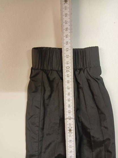 Entdecke unsere Vintage Track Pants von Nike und anderen Marken, erhältlich bei Valuxery.de - Dein Shop für trendige Vintage - Kleidung. Unsere Track Pants sind aus hochwertigen Materialien und