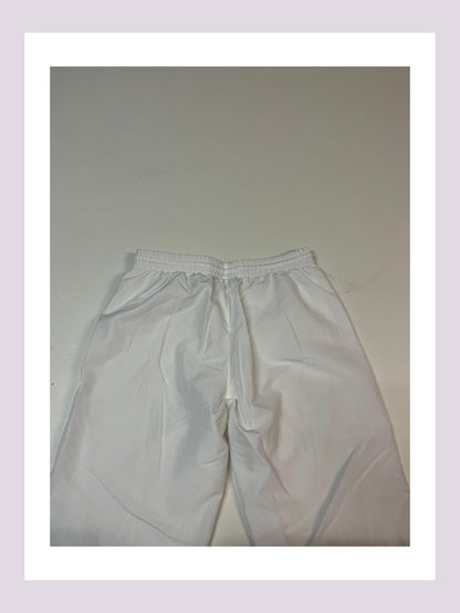 Entdecke unsere Vintage Track Pants von Nike und anderen Marken, erhältlich bei Valuxery.de - Dein Shop für trendige Vintage - Kleidung. Unsere Track Pants sind aus hochwertigen Materialien und