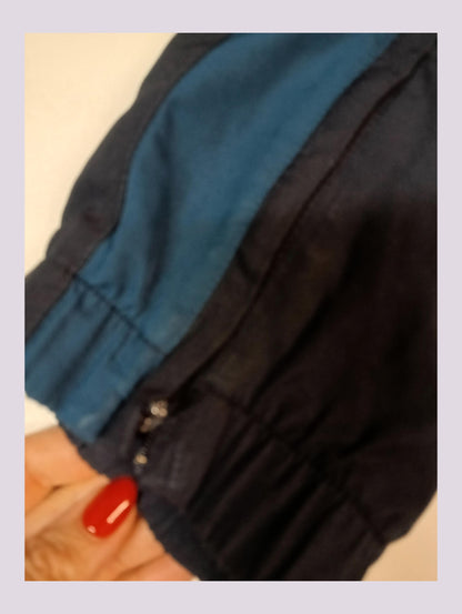 Entdecke unsere Vintage Track Pants von Nike und anderen Marken, erhältlich bei Valuxery.de - Dein Shop für trendige Vintage - Kleidung. Unsere Track Pants sind aus hochwertigen Materialien und