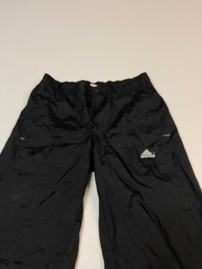 Entdecke unsere Vintage Track Pants von Nike und anderen Marken, erhältlich bei Valuxery.de - Dein Shop für trendige Vintage - Kleidung. Unsere Track Pants sind aus hochwertigen Materialien und