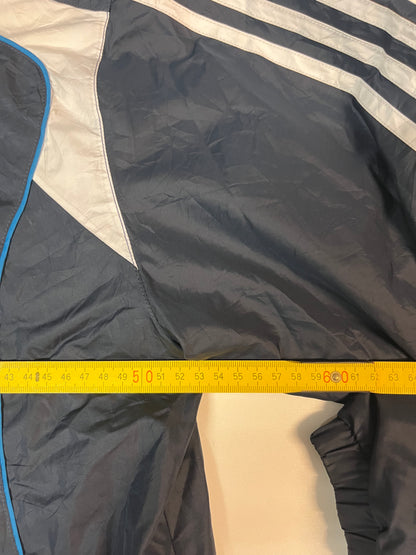 Entdecke unsere Vintage Track Pants von Nike und anderen Marken, erhältlich bei Valuxery.de - Dein Shop für trendige Vintage - Kleidung. Unsere Track Pants sind aus hochwertigen Materialien und