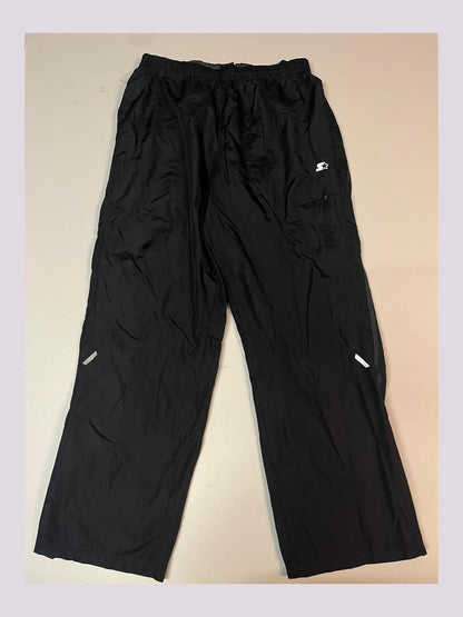 Entdecke unsere Vintage Track Pants von Nike und anderen Marken, erhältlich bei Valuxery.de - Dein Shop für trendige Vintage - Kleidung. Unsere Track Pants sind aus hochwertigen Materialien und