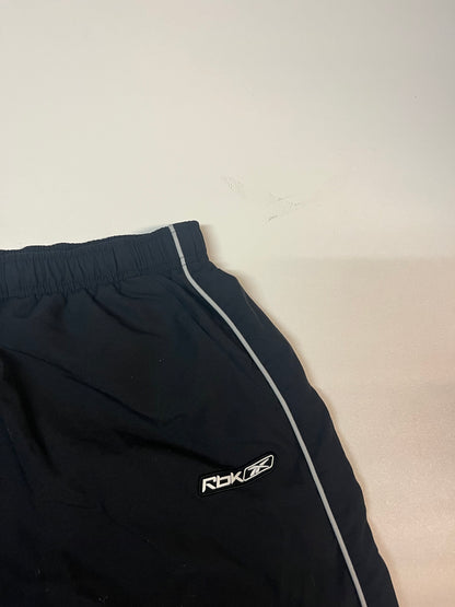 Entdecke unsere Vintage Track Pants von Nike und anderen Marken, erhältlich bei Valuxery.de - Dein Shop für trendige Vintage - Kleidung. Unsere Track Pants sind aus hochwertigen Materialien und