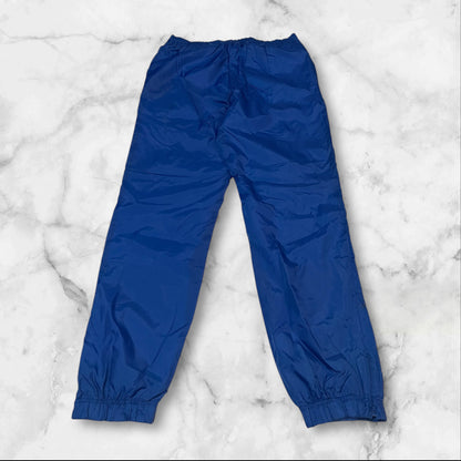 Entdecke unsere Vintage Track Pants von Nike und anderen Marken, erhältlich bei Valuxery.de - Dein Shop für trendige Vintage - Kleidung. Unsere Track Pants sind aus hochwertigen Materialien und