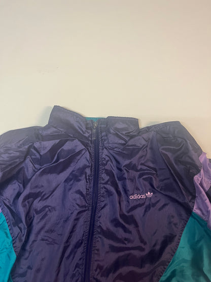 Entdecke unsere Vintage Track Pants von Nike und anderen Marken, erhältlich bei Valuxery.de - Dein Shop für trendige Vintage - Kleidung. Unsere Track Pants sind aus hochwertigen Materialien und